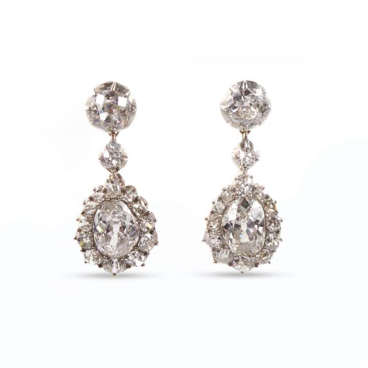 Pair of diamond pear shaped cluster pendant earrings